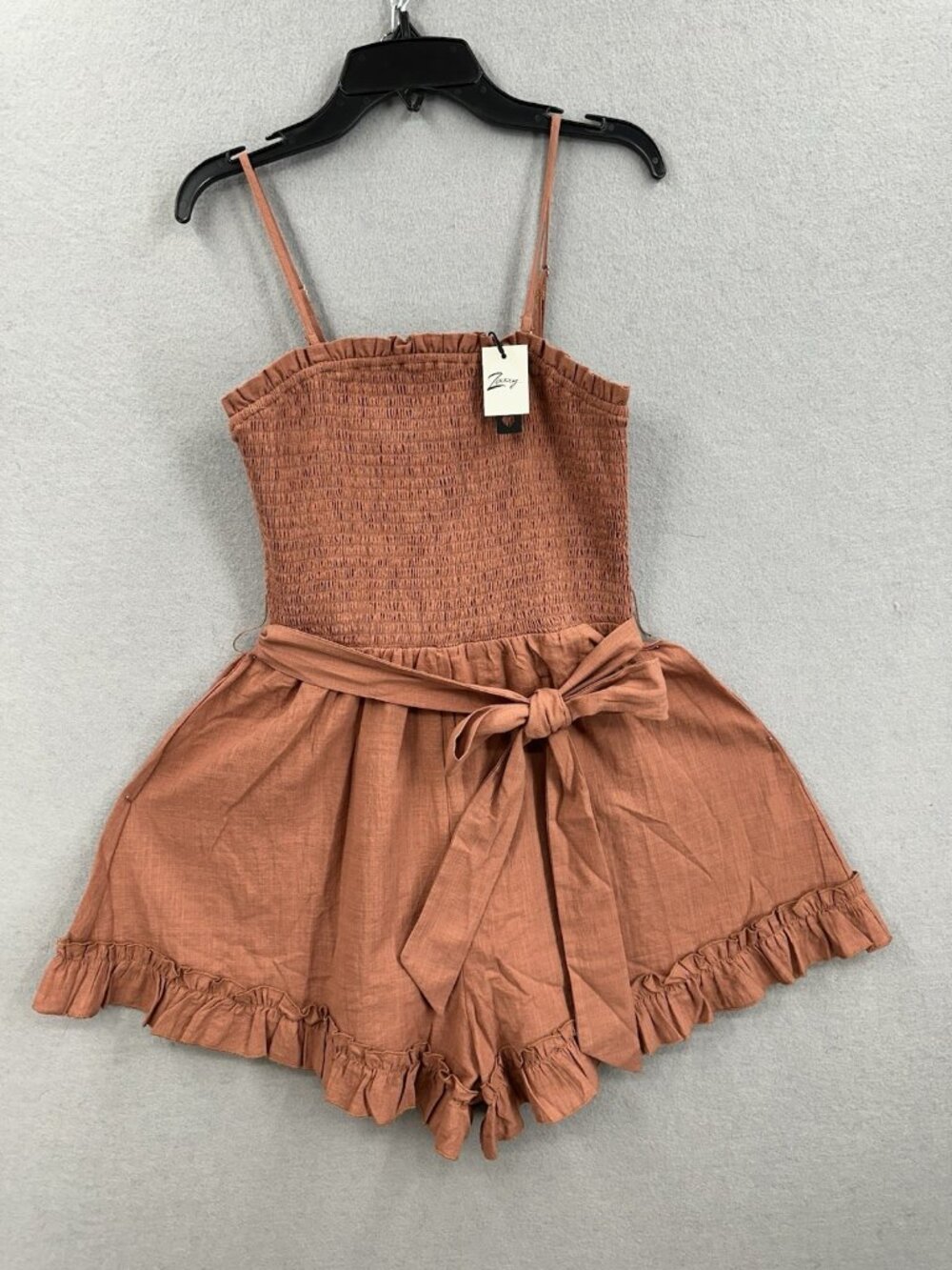 Zexxy Romper Size S Smocked Bodice Ruffle Hem Tie Waist Terracotta Linen Blend